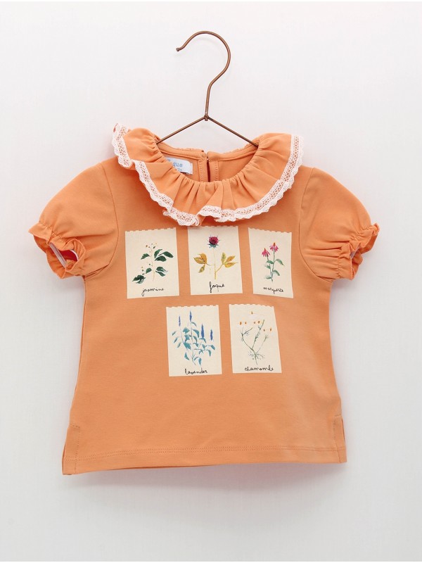 Camiseta cuello volante con estampado flores
