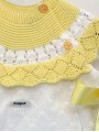 Vestido bordado con capacete punto