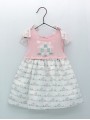 Vestido tipo faldón punto y tela en estampado casitas