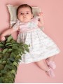 Vestido tipo faldón punto y tela en estampado casitas