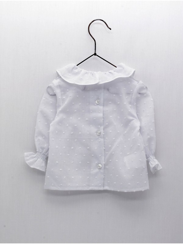 Blusa plumetti con cuello volante