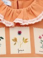 Camiseta cuello volante con estampado flores