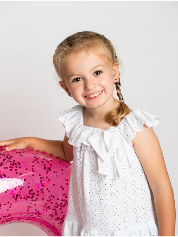 Vestido niña punto circular calado con cuello volante y gran lazada