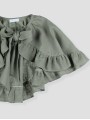 Cape with bow