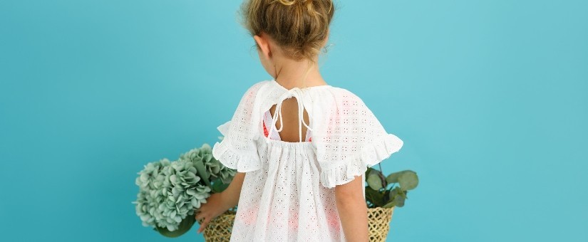 Vestidos e blusas de banho para menina